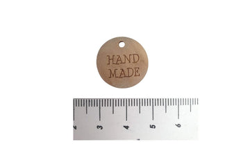 Holzzierteil mit Schriftzug "handmade"
